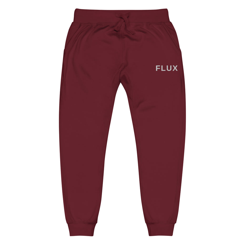 Front view of FLX AWAY Maroon fleece joggers with solid white FLUX embroidery at the wearer-left hip and matching drawstrings.