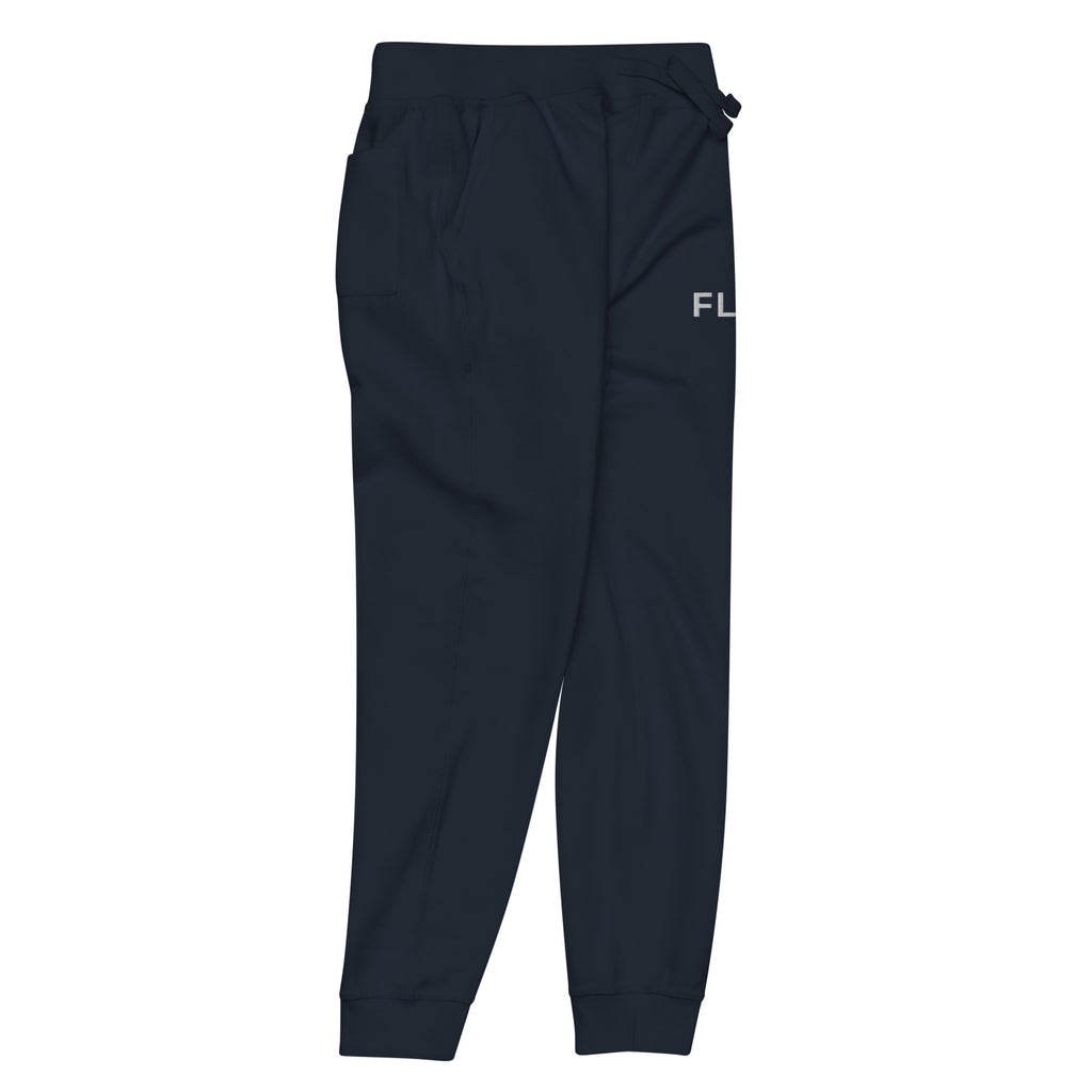 Angled front-right view of the FLX HOME Blue Side Fleeced Jogger, showing the tapered leg and ribbed cuff.