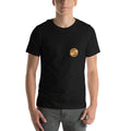 Model wearing the black FLX V-Money Coin Tee, with a small gold-coloured coin print at the wearer-left chest.